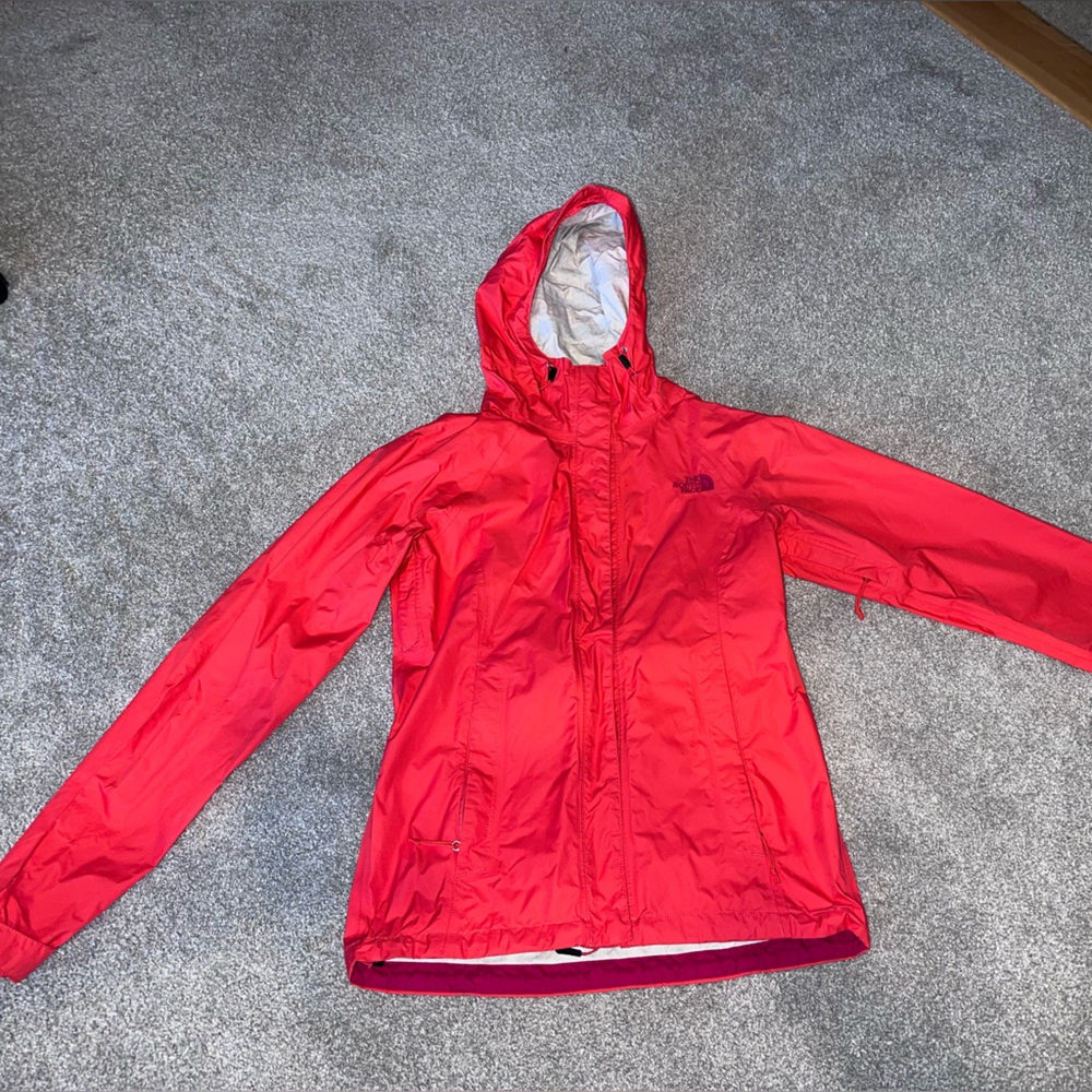North face raincoat. Gorgeous coral color! Great condition!